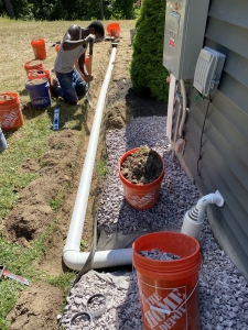 Exterior discharge line installation