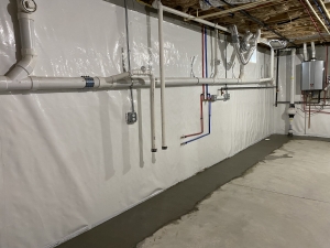 Vapor Barrier and drainage interior system
