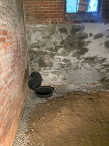 sump basin prep for drainage system installation