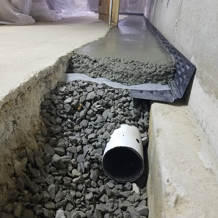 PVC piping under concrete for basement waterproofing