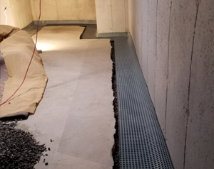 Basement drain system tiles